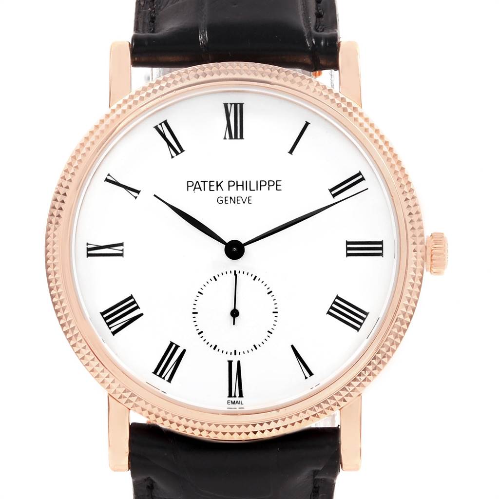 This is a close-up, front-facing view of a Patek Philippe Calatrava 5116R Men's Rose Gold White Dial 5116R Men's Rose Gold White Dial watch displaying its dial and part of the leather strap.