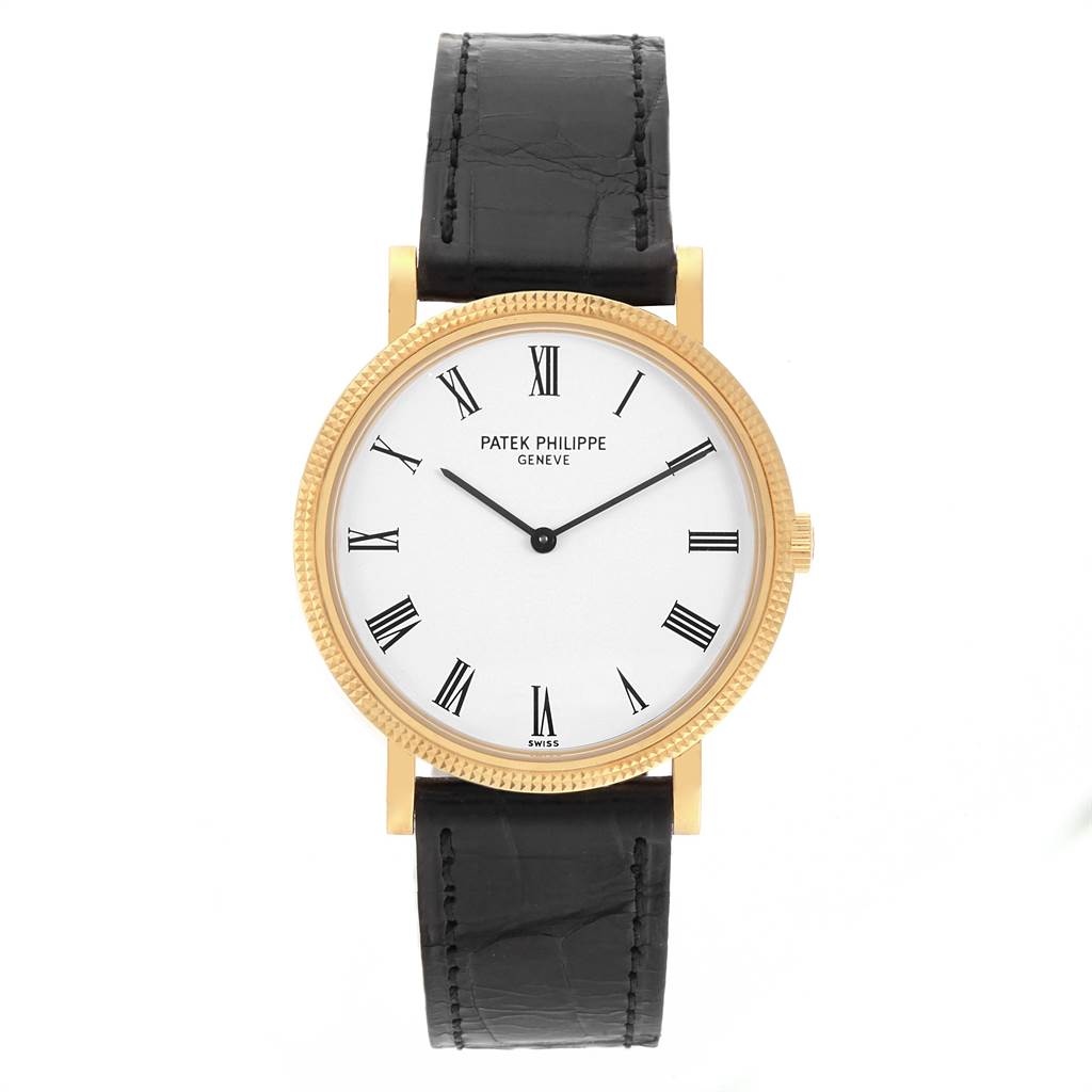 The Patek Philippe Calatrava 5120J Men's Yellow Gold White Dial 5120J Men's Yellow Gold White Dial watch is shown from the front, displaying the face, bezel, and black leather strap.