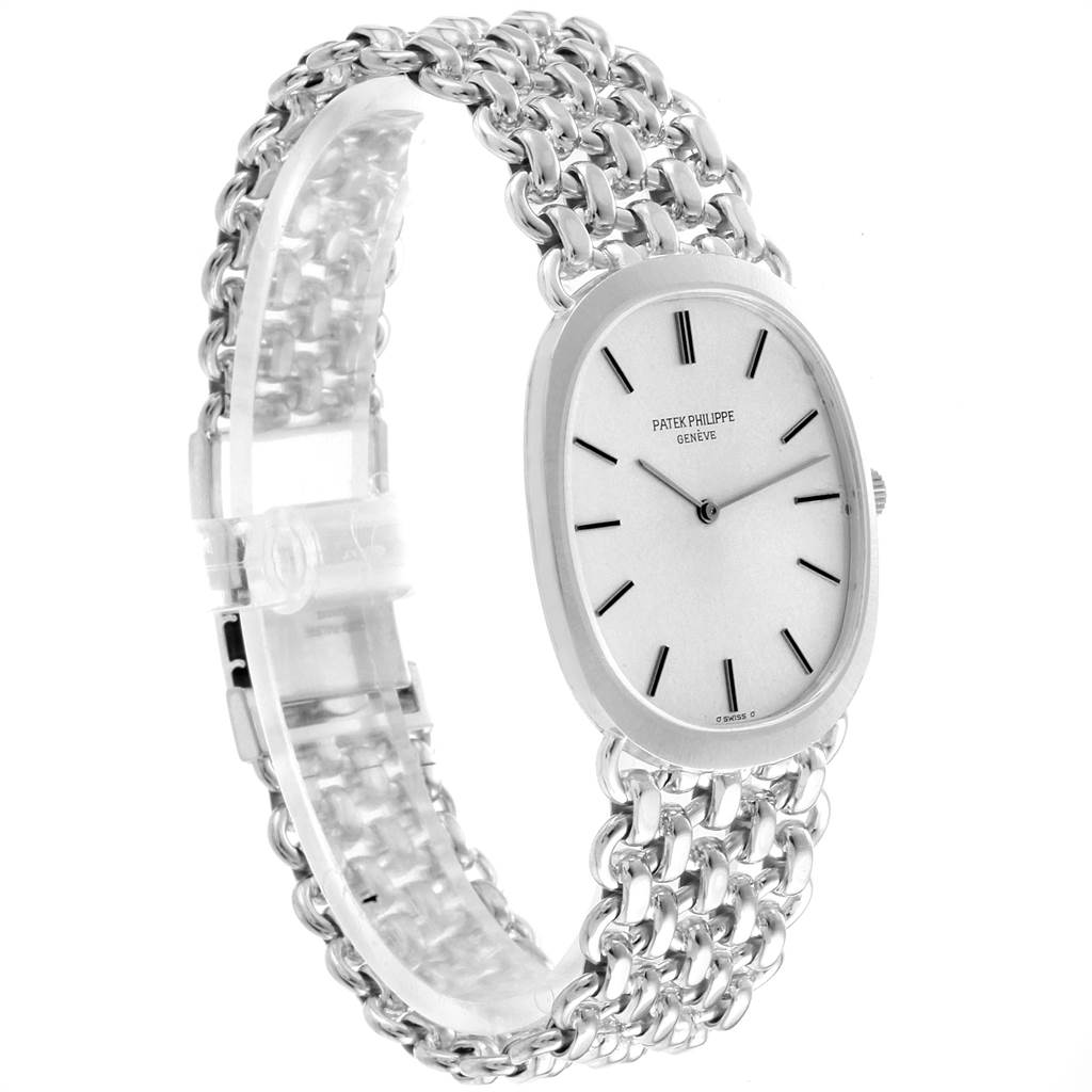 The image shows a side view of the Patek Philippe Golden Ellipse 3577 Men's White Gold Silver Dial 3577 Men's White Gold Silver Dial watch, highlighting the oval case, dial, and chain link bracelet.