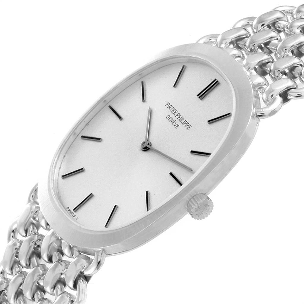 The image shows a close-up angle of the Patek Philippe Golden Ellipse 3577 Men's White Gold Silver Dial 3577 Men's White Gold Silver Dial watch face and partial metal bracelet.