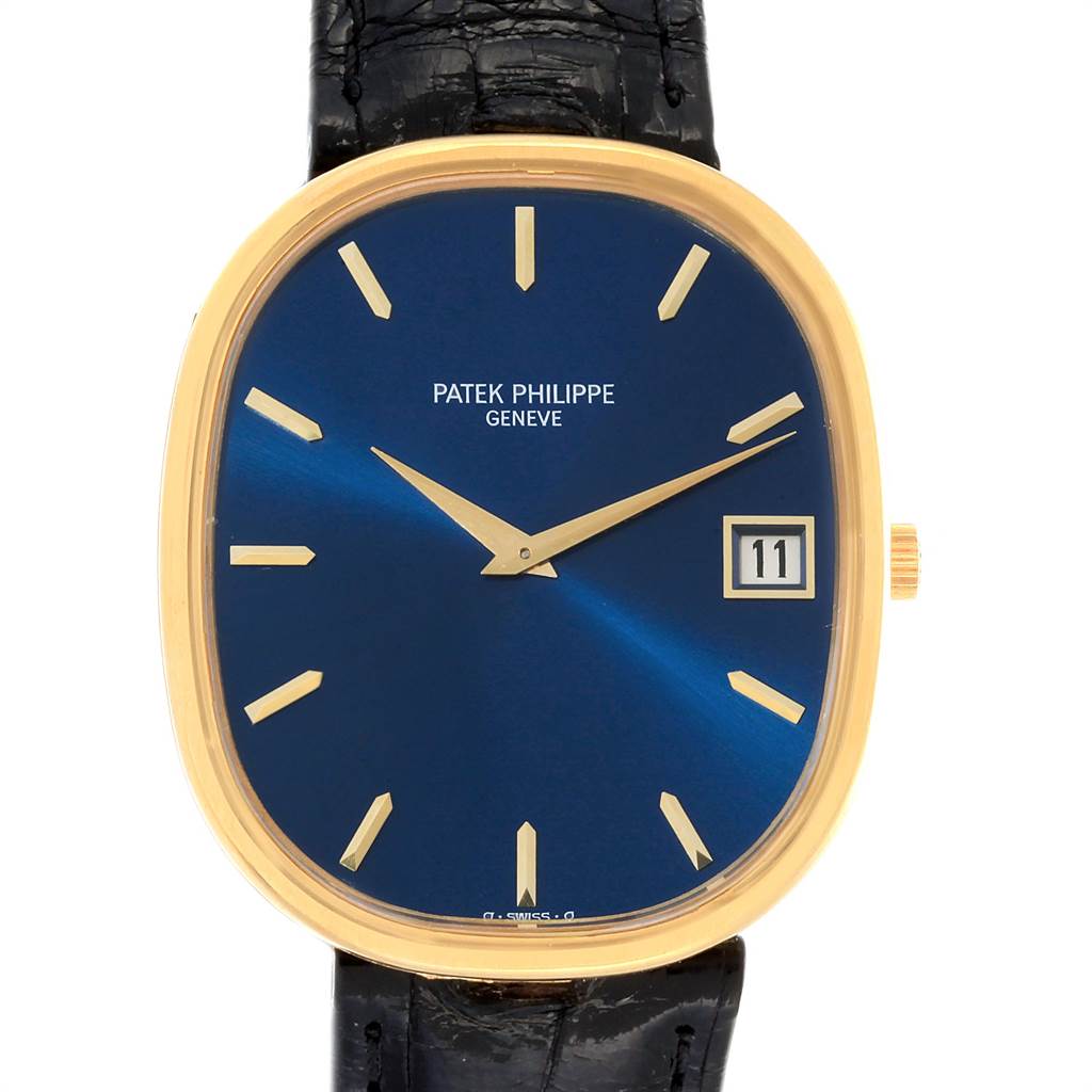 This image shows a front view of the Patek Philippe Golden Ellipse 3605 Men's Yellow Gold Blue Dial 3605 Men's Yellow Gold Blue Dial watch, highlighting its blue dial, gold markers, and black strap.