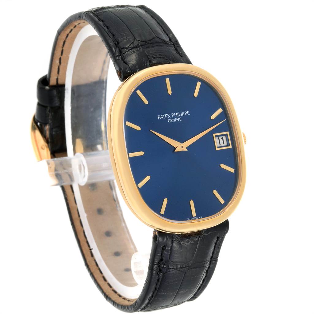 The image shows a side profile of the Patek Philippe Golden Ellipse 3605 Men's Yellow Gold Blue Dial 3605 Men's Yellow Gold Blue Dial watch, highlighting the case, face, strap, and date window.