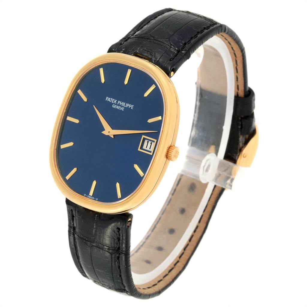 The image shows a Patek Philippe Golden Ellipse 3605 Men's Yellow Gold Blue Dial 3605 Men's Yellow Gold Blue Dial watch at a three-quarter angle, highlighting the face, case, and strap.