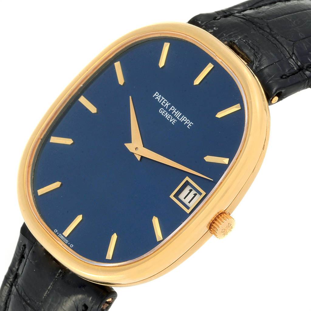 This image shows a Patek Philippe Golden Ellipse 3605 Men's Yellow Gold Blue Dial 3605 Men's Yellow Gold Blue Dial watch angled from the front, displaying the face, hands, crown, strap, and date window.