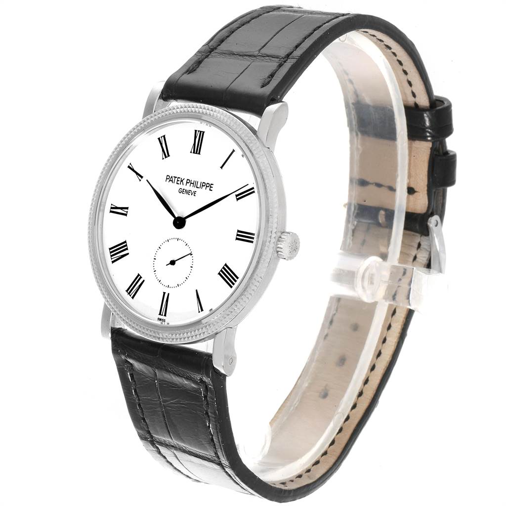 The image displays a Patek Philippe Calatrava 5119G Men's White Gold White Dial 5119G Men's White Gold White Dial watch from a three-quarter angle, showing the face, bezel, crown, and leather strap.
