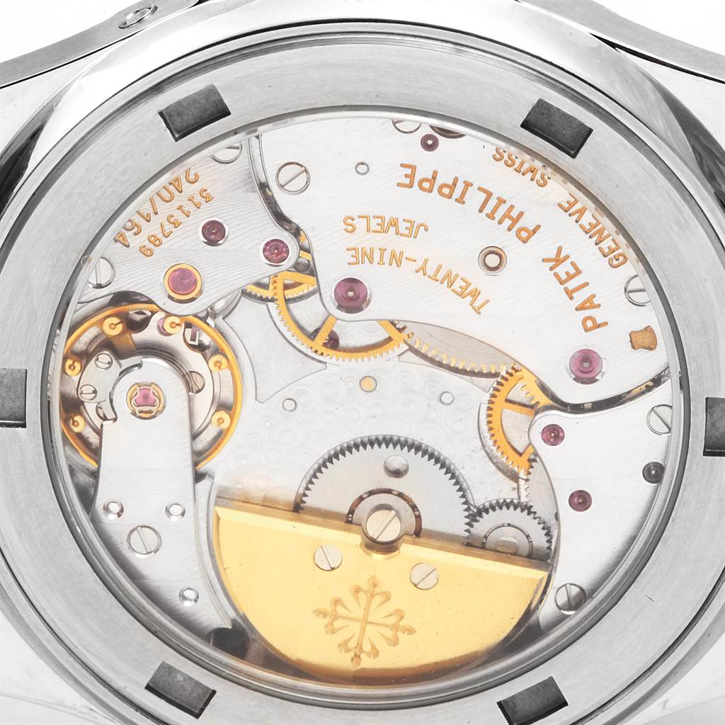 The image shows the Patek Philippe Neptune 5085A/1A-001 Men's Stainless Steel Black Dial 5085A/1A-001 Men's Stainless Steel Black Dial watch's movement from the back, revealing its intricate mechanical components.