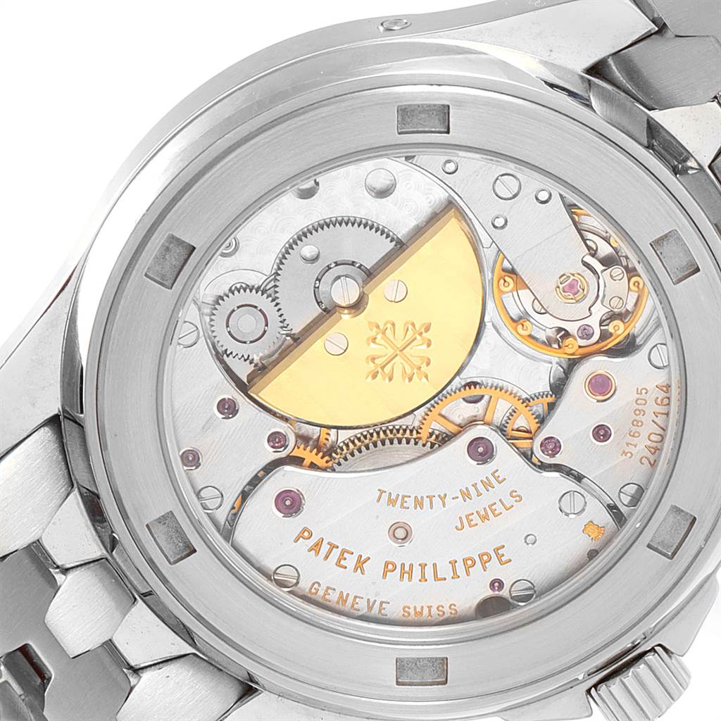 The image shows the back view of a Patek Philippe Neptune 5085A/1A-001 Men
s Stainless Steel Black Dial 5085A/1A-001 Men
s Stainless Steel Black Dial model watch, highlighting its internal mechanical components and engravings.