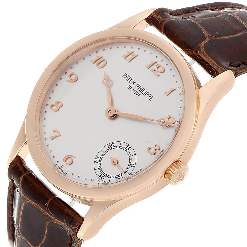 This image shows a Patek Philippe Calatrava 5026R Men
s Rose Gold Silver Dial 5026R Men
s Rose Gold Silver Dial watch from a slightly angled, close-up view.
