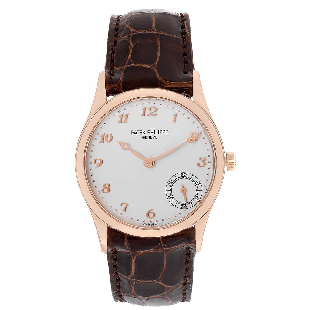 The image shows a front view of a Patek Philippe Calatrava 5026R Men
s Rose Gold Silver Dial 5026R Men
s Rose Gold Silver Dial watch with a brown leather strap and a white dial featuring gold hour markers.