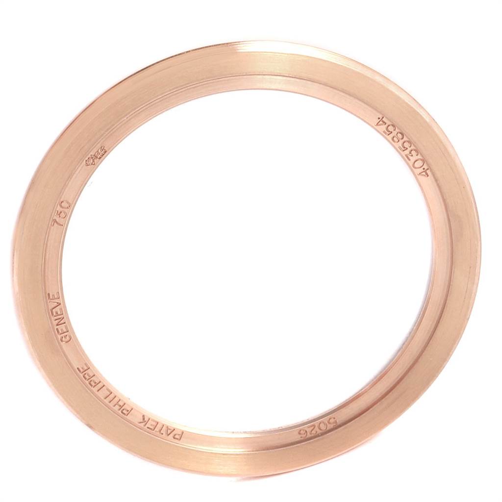 This image shows a bezel for the Patek Philippe Calatrava 5026R Men's Rose Gold Black Dial 5026R Men's Rose Gold Black Dial watch, viewed from a top angle.