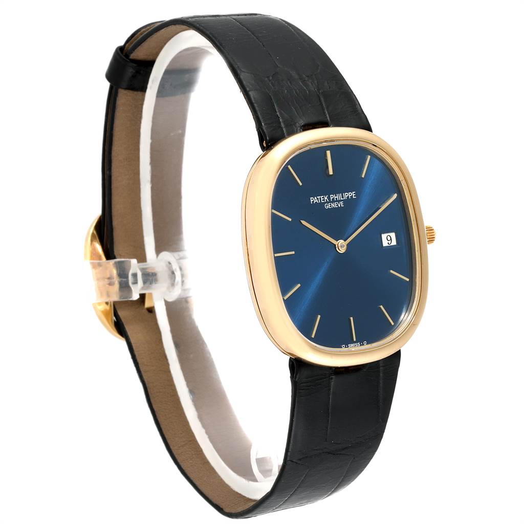 The image shows a side view of a Patek Philippe Golden Ellipse 3747 Men
s Yellow Gold Blue Dial 3747 Men
s Yellow Gold Blue Dial watch with a blue dial and black leather strap.