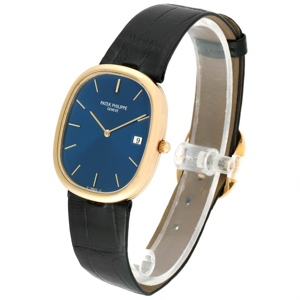 The image shows a side view of the Patek Philippe Golden Ellipse 3747 Men
s Yellow Gold Blue Dial 3747 Men
s Yellow Gold Blue Dial watch, showcasing its blue dial, gold case, and black leather strap.
