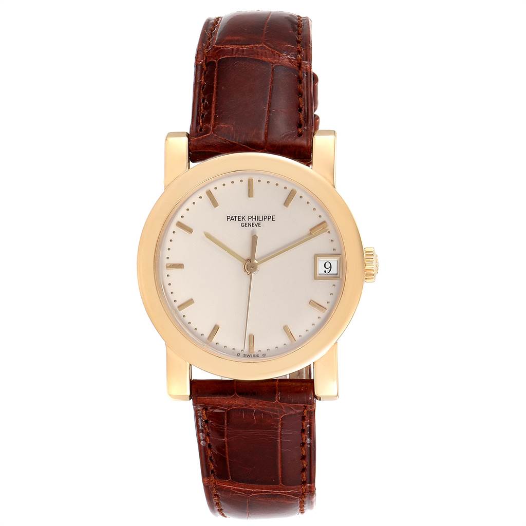 The image shows a front view of the Patek Philippe Calatrava 5012 Men's Yellow Gold Beige Dial 5012 Men's Yellow Gold Beige Dial watch, showcasing its dial, case, and brown leather strap.