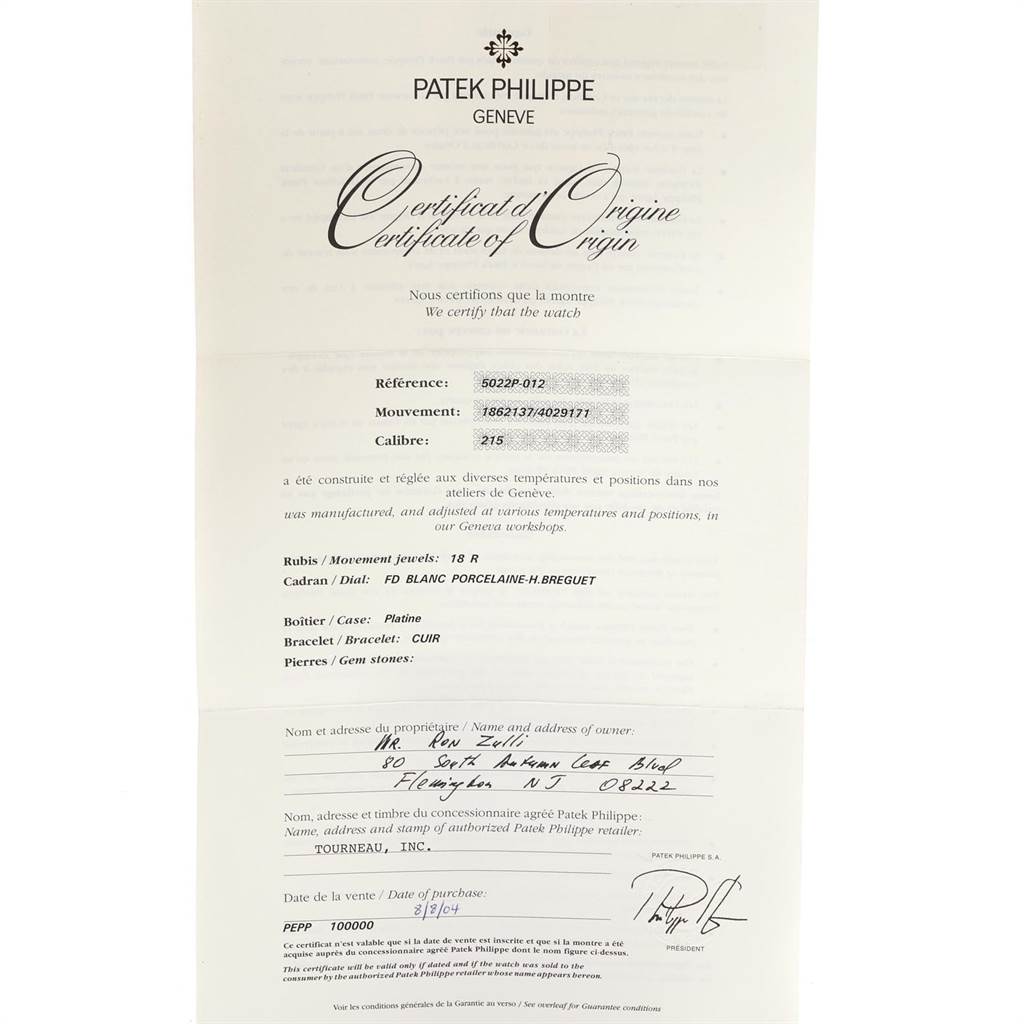 The image shows a Certificate of Origin for the Patek Philippe Calatrava 5022P Men's Platinum White Dial 5022P Men's Platinum White Dial model, providing details such as reference, movement, and caliber.