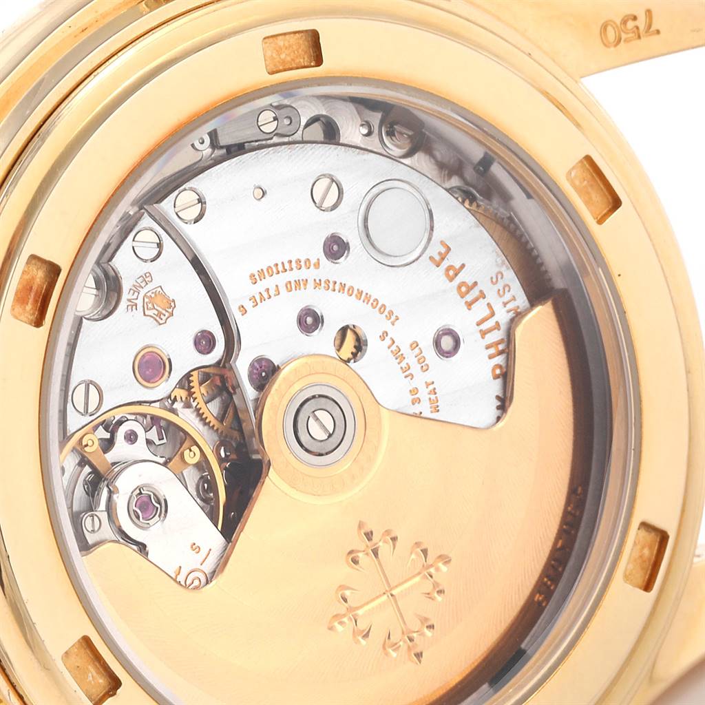 This is a close-up of the movement and inner mechanism of the Patek Philippe 5146J Men
s Yellow Gold Beige Dial 5146J Men
s Yellow Gold Beige Dial Complicated Annual Calendar Yellow Gold Mens Watch 5146J.