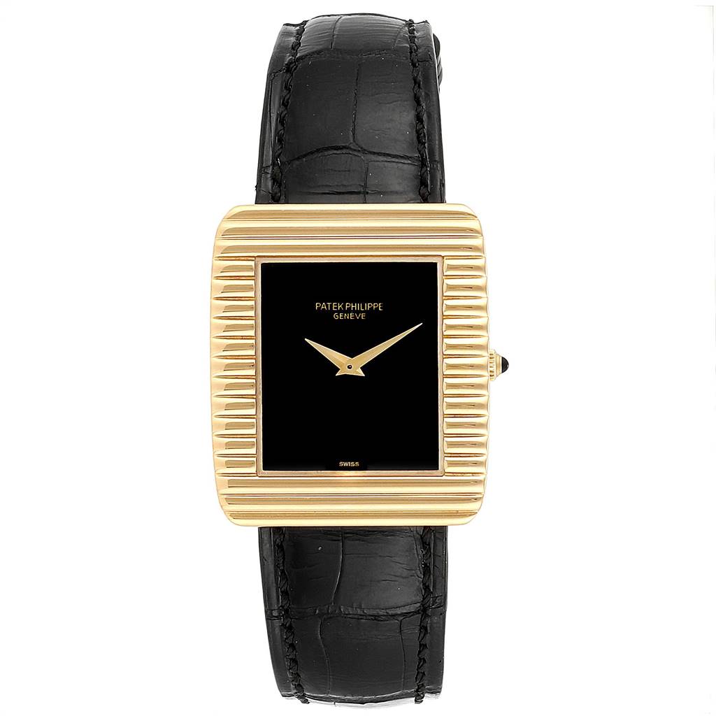 This image shows a front view of the Vintage Patek Philippe watch, featuring a black strap and a gold-ridged rectangular case.