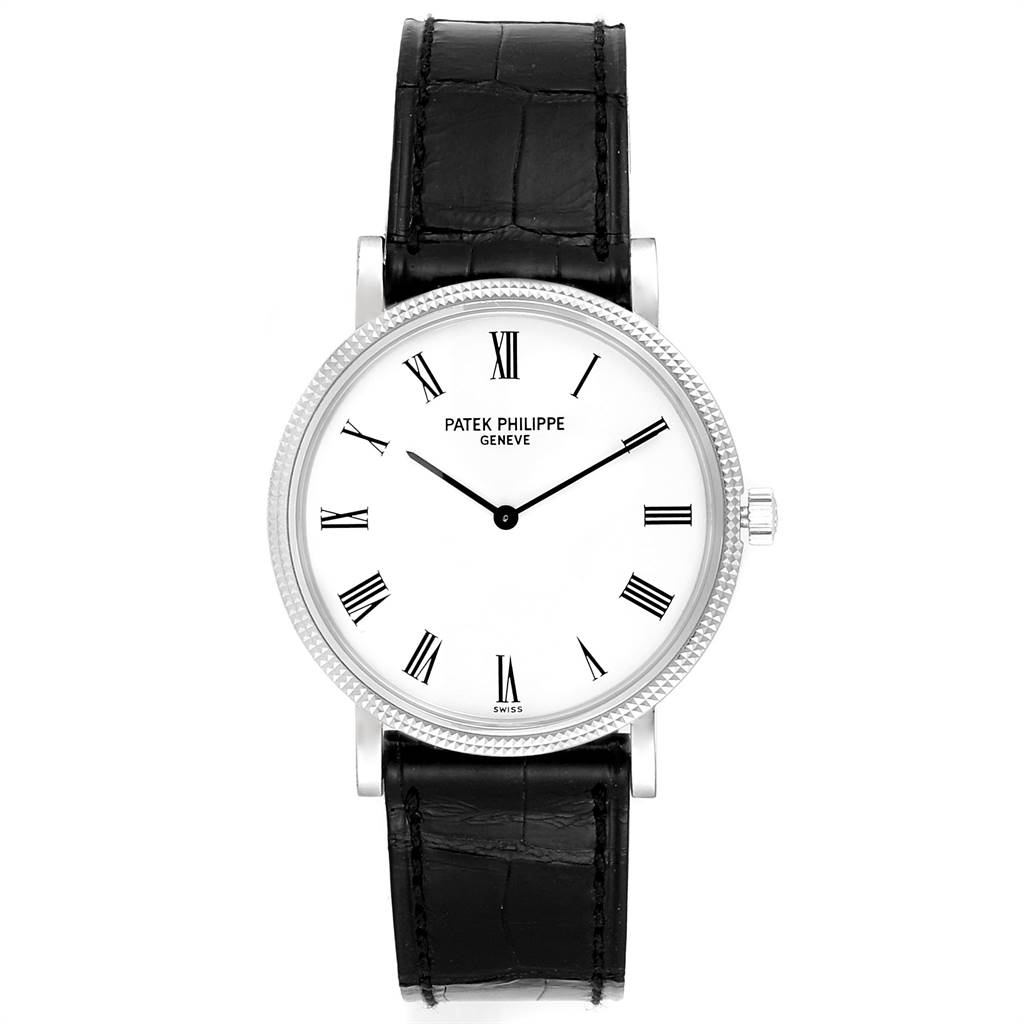The image shows a frontal view of a Patek Philippe Calatrava 5120G Men's White Gold White Dial 5120G Men's White Gold White Dial watch, featuring its white dial, Roman numerals, and black leather strap.
