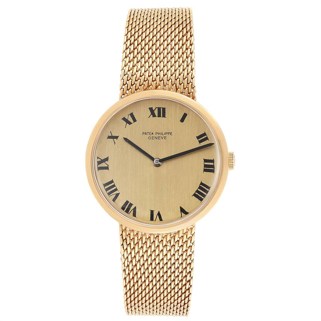 This image shows a front view of the Patek Philippe Calatrava 3562 Men's Yellow Gold Champagne Dial 3562 Men's Yellow Gold Champagne Dial watch, highlighting its face, Roman numeral markers, and mesh bracelet.