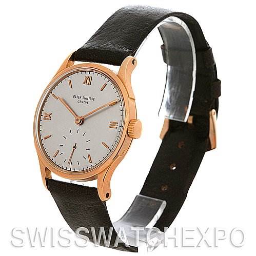 The image shows a front and partial side view of a Vintage Patek Philippe watch, highlighting the dial, hands, case, and leather strap.