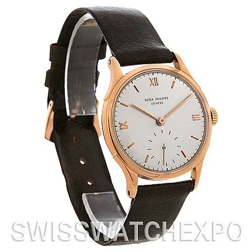 This image shows a Patek Philippe Vintage model watch at a slight angle, highlighting its face, leather strap, and crown.