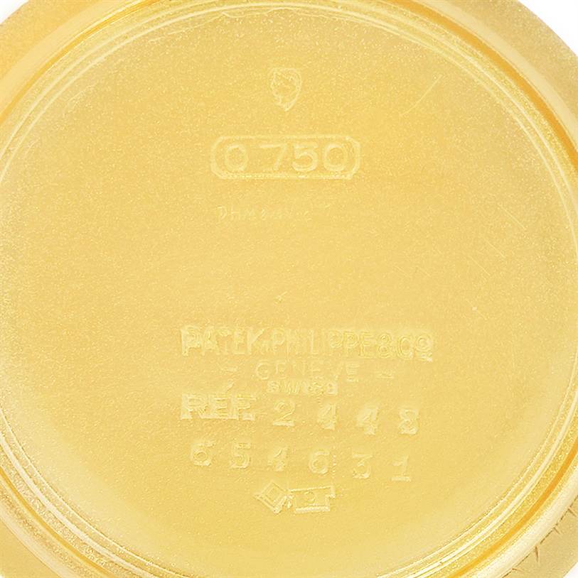 This image shows the inside case back of a Vintage Patek Philippe watch, displaying model and reference numbers.