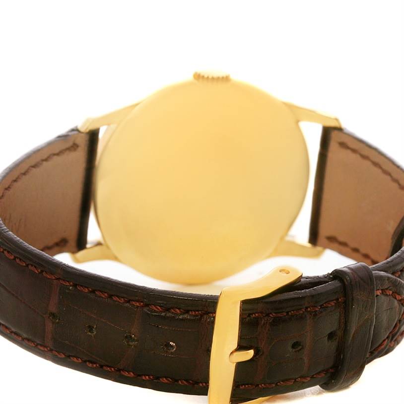 This image shows the back case and strap buckle of the Vintage Patek Philippe watch from a rear angle.