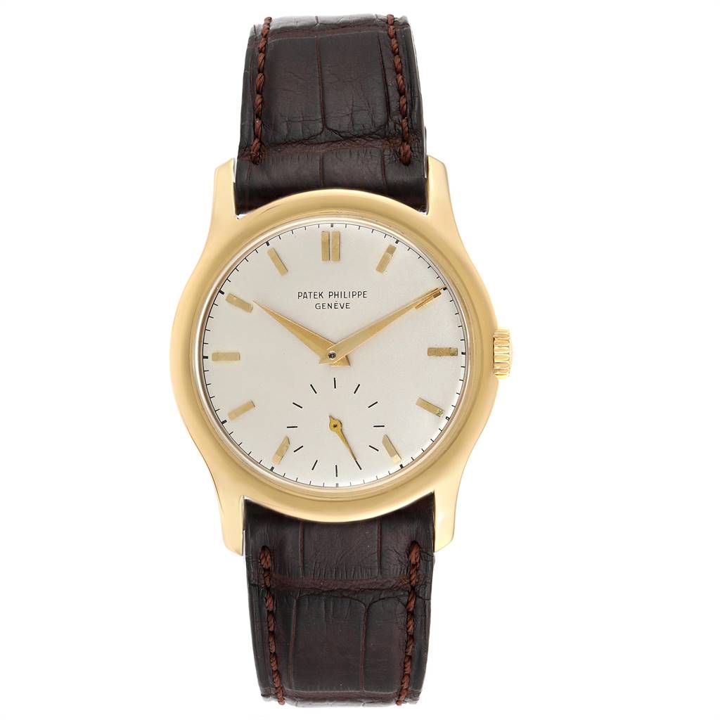 The image shows a front view of the Vintage Patek Philippe watch, displaying its gold case and brown leather strap.