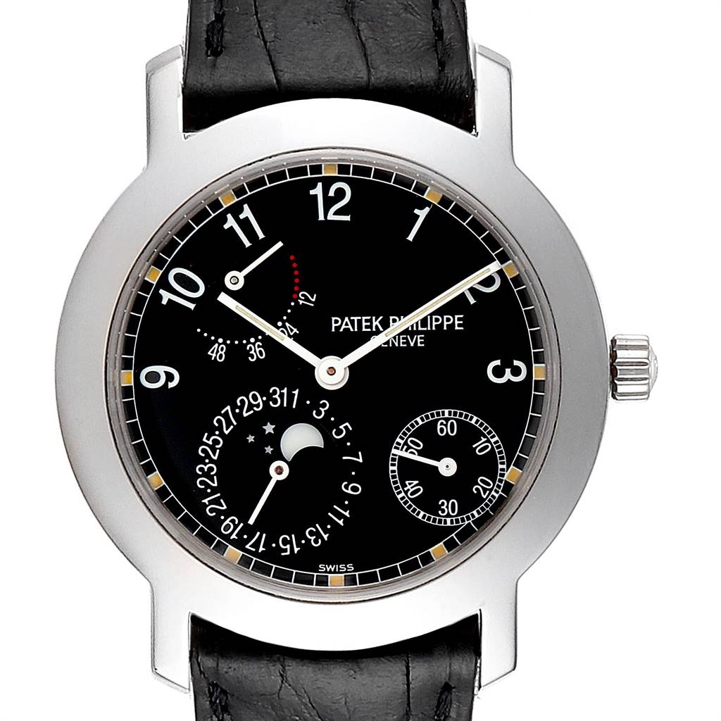 The image shows a front view of the Patek Philippe 5055G Men's White Gold Black Dial 5055G Men's White Gold Black Dial Moonphase Power Reserve White Gold Automatic Watch 5055 model, displaying the dial and black leather strap.