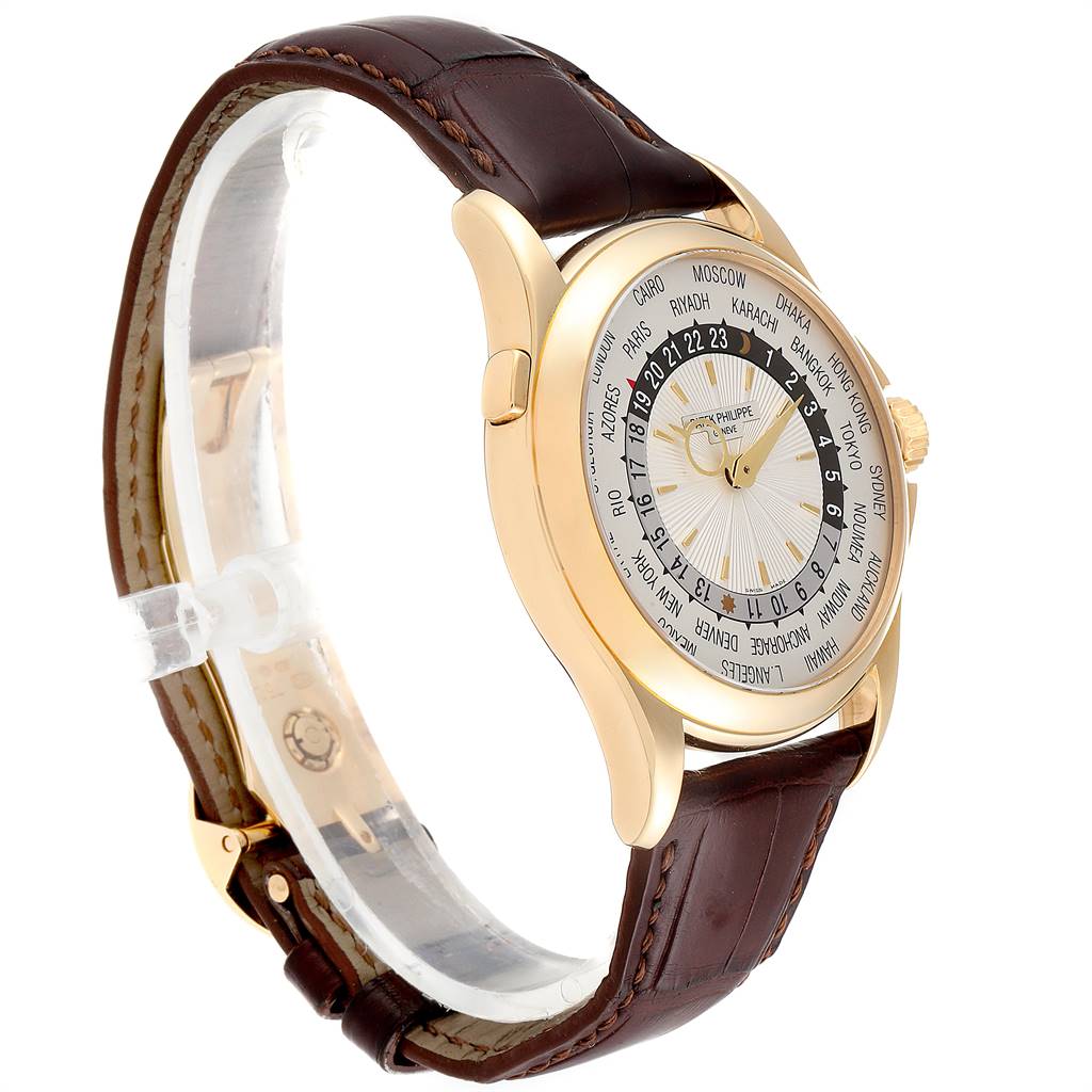 The image shows a side view of a Patek Philippe Complications 5130J Men's Yellow Gold Silver Dial 5130J Men's Yellow Gold Silver Dial watch, highlighting its gold case and brown leather strap.