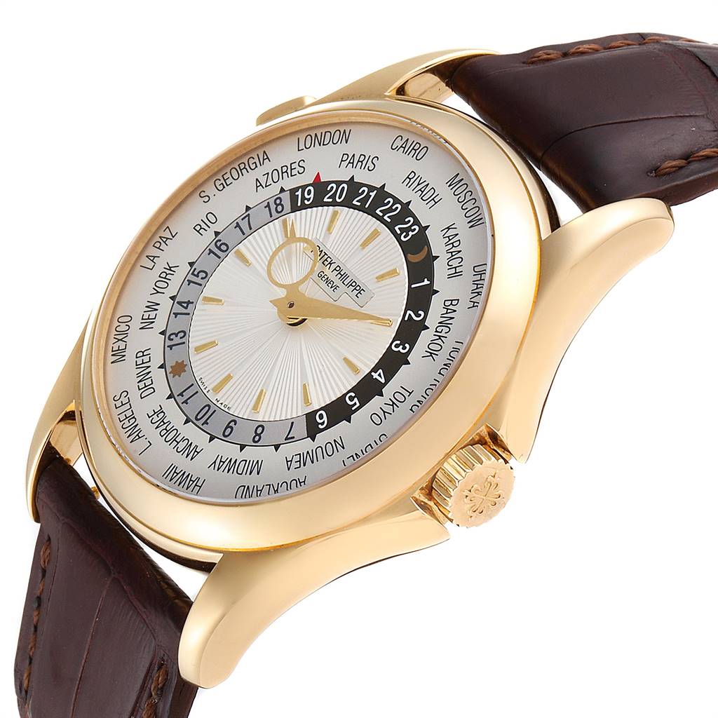 The image shows a side view of the Patek Philippe Complications 5130J Men's Yellow Gold Silver Dial 5130J Men's Yellow Gold Silver Dial model watch, highlighting its dial, bezel, crown, and leather strap.
