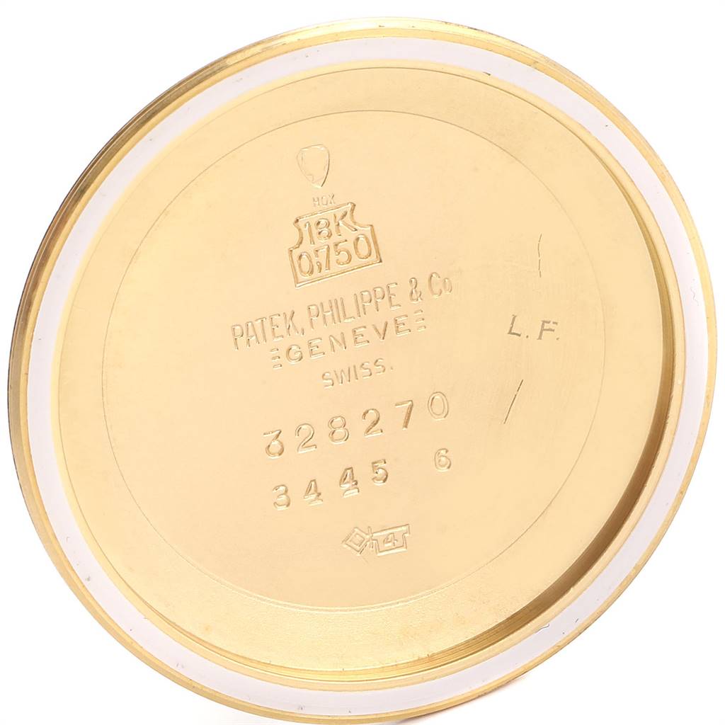 The image shows the inside of the case back of a vintage Patek Philippe watch.