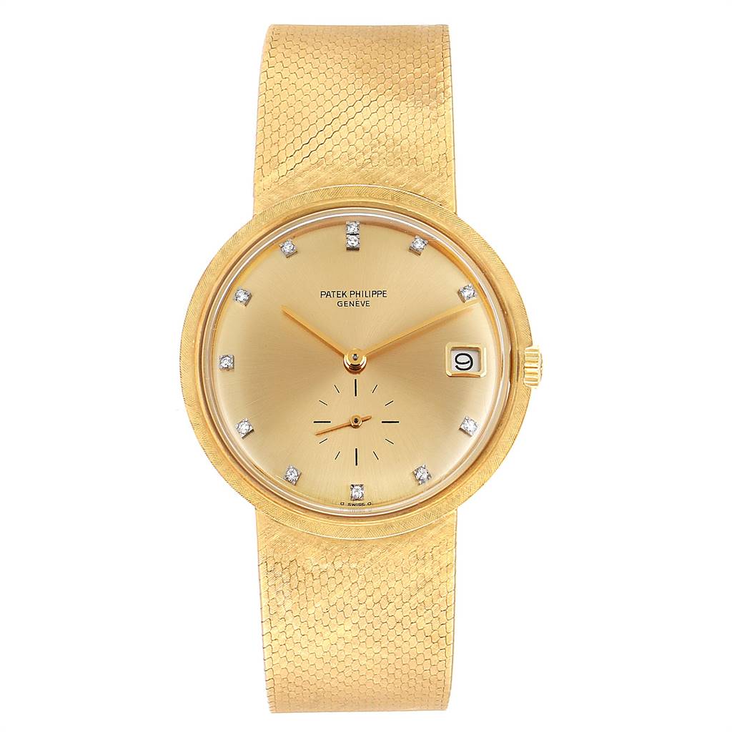 The image shows a frontal view of a Vintage Patek Philippe watch, highlighting the golden face, date window, and textured gold strap.