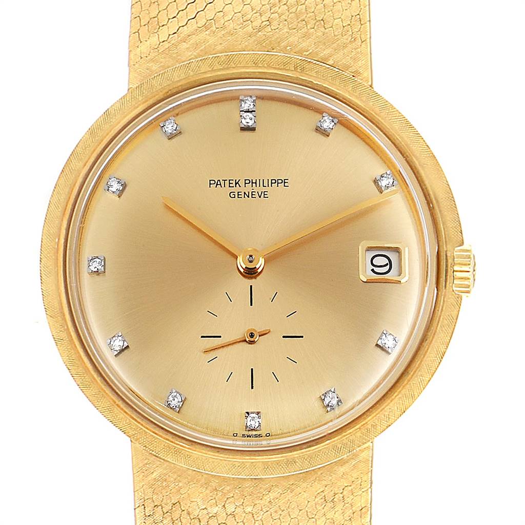 This image shows a frontal view of the Patek Philippe Calatrava 3445 Men's Yellow Gold Champagne Dial 3445 Men's Yellow Gold Champagne Dial watch, displaying the face, dial, and part of the strap.