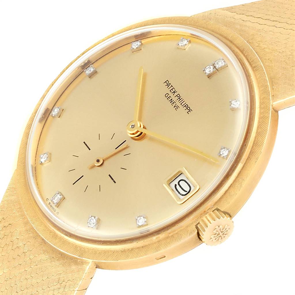 This image shows the front angle of a Patek Philippe Vintage watch, highlighting the dial, date window, and crown.