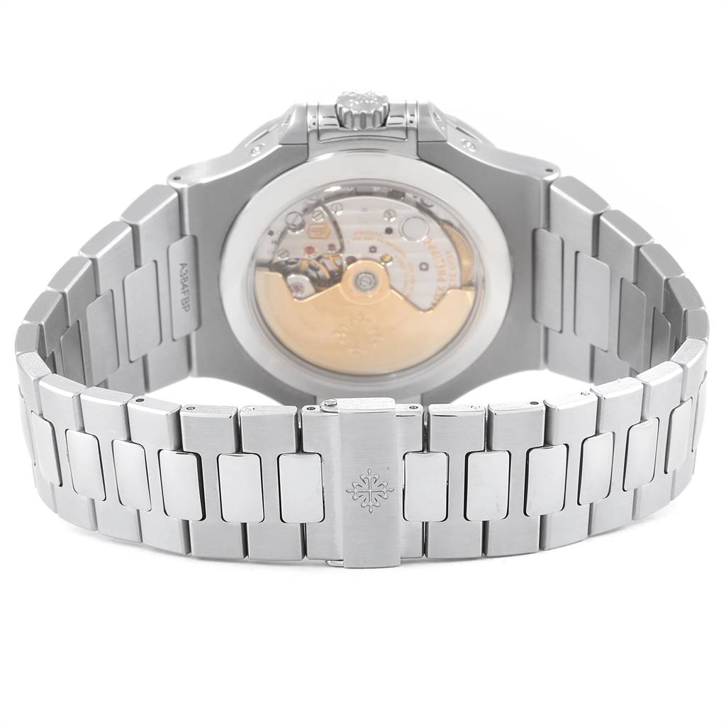 The image shows the back view of a Patek Philippe Nautilus 5726/1A-001 Men's Stainless Steel Black Dial 5726/1A-001 Men's Stainless Steel Black Dial watch, highlighting its movement and stainless steel bracelet.