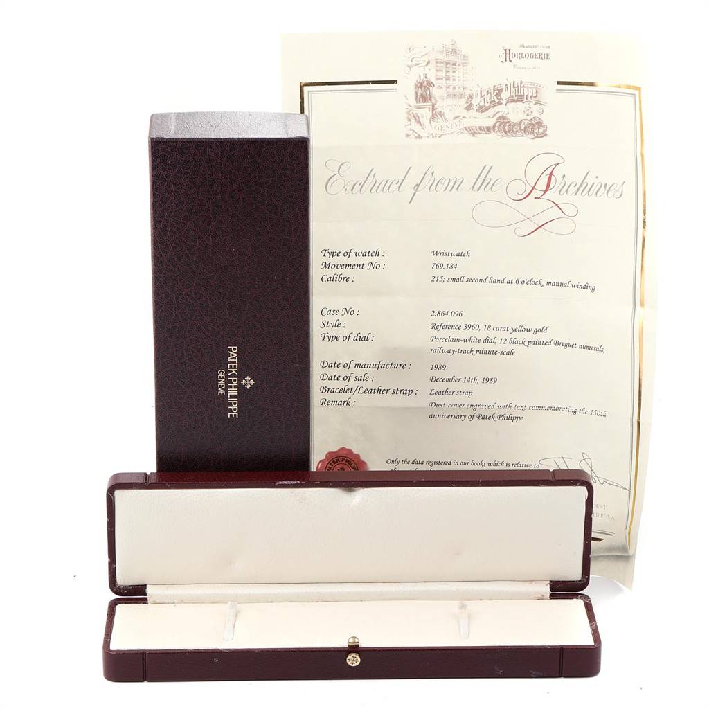 The image shows the box and documentation for a Patek Philippe Calatrava 3960 Men's Yellow Gold White Dial 3960 Men's Yellow Gold White Dial watch from a front angle.