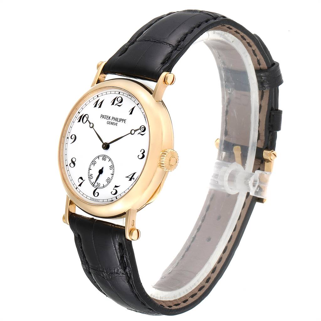 The Patek Philippe Calatrava 3960 Men's Yellow Gold White Dial 3960 Men's Yellow Gold White Dial watch is shown at an angled side view highlighting its dial, case, and leather strap.