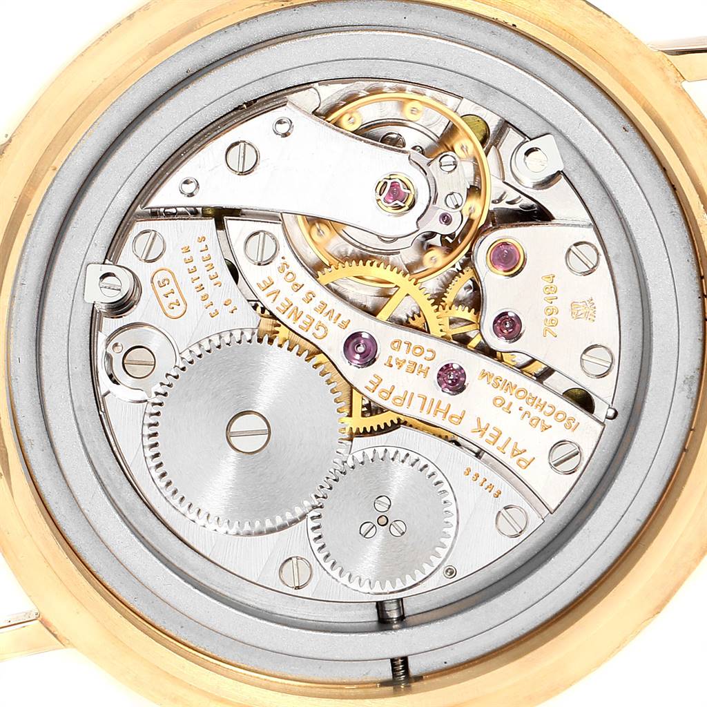This image shows the inner mechanical movement of a Patek Philippe Calatrava 3960 Men's Yellow Gold White Dial 3960 Men's Yellow Gold White Dial watch from a close-up, back angle.