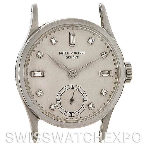 The image shows a front view of a Vintage Patek Philippe watch, highlighting its face, dial, hands, and crown.
