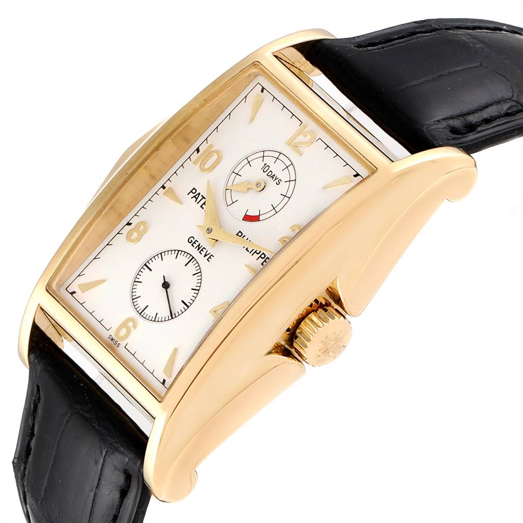 This image shows a side angle of the Patek Philippe Gondolo 5100J Men's Yellow Gold Silver Dial 5100J Men's Yellow Gold Silver Dial watch, highlighting the crown, case, and part of the strap.