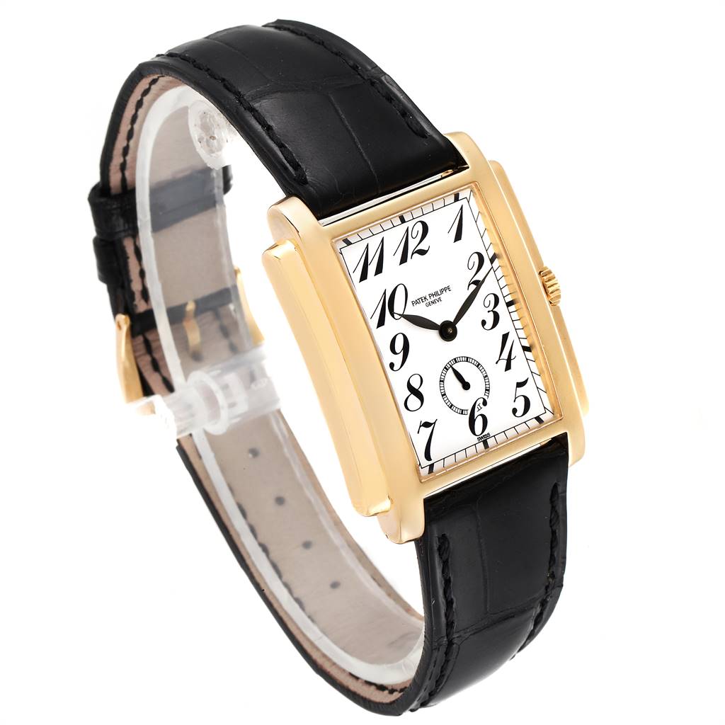 The image shows a Patek Philippe Gondolo 5024J Men's Yellow Gold White Dial 5024J Men's Yellow Gold White Dial watch at an angled side view, highlighting its black leather strap and rectangular gold case.