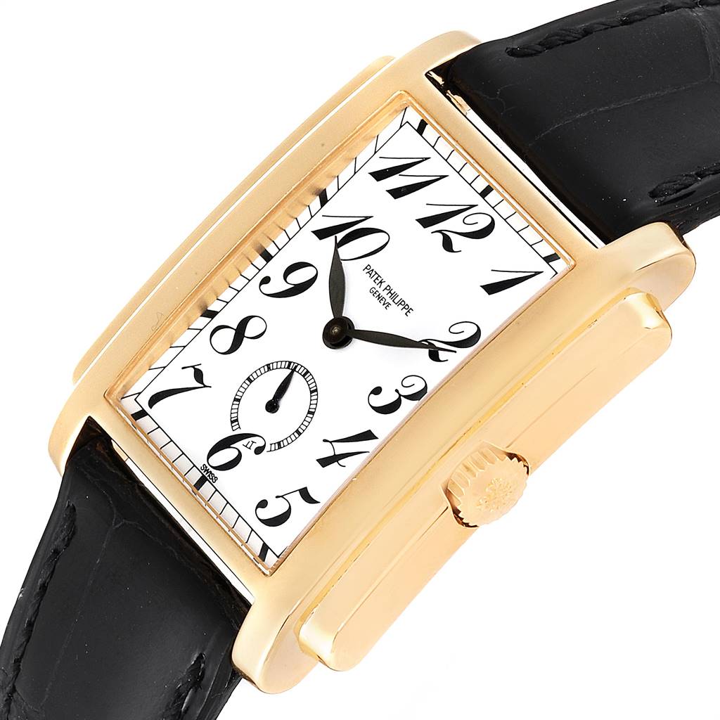 The image shows a Patek Philippe Gondolo 5024J Men's Yellow Gold White Dial 5024J Men's Yellow Gold White Dial watch at an angled view, displaying its dial, crown, and leather strap.