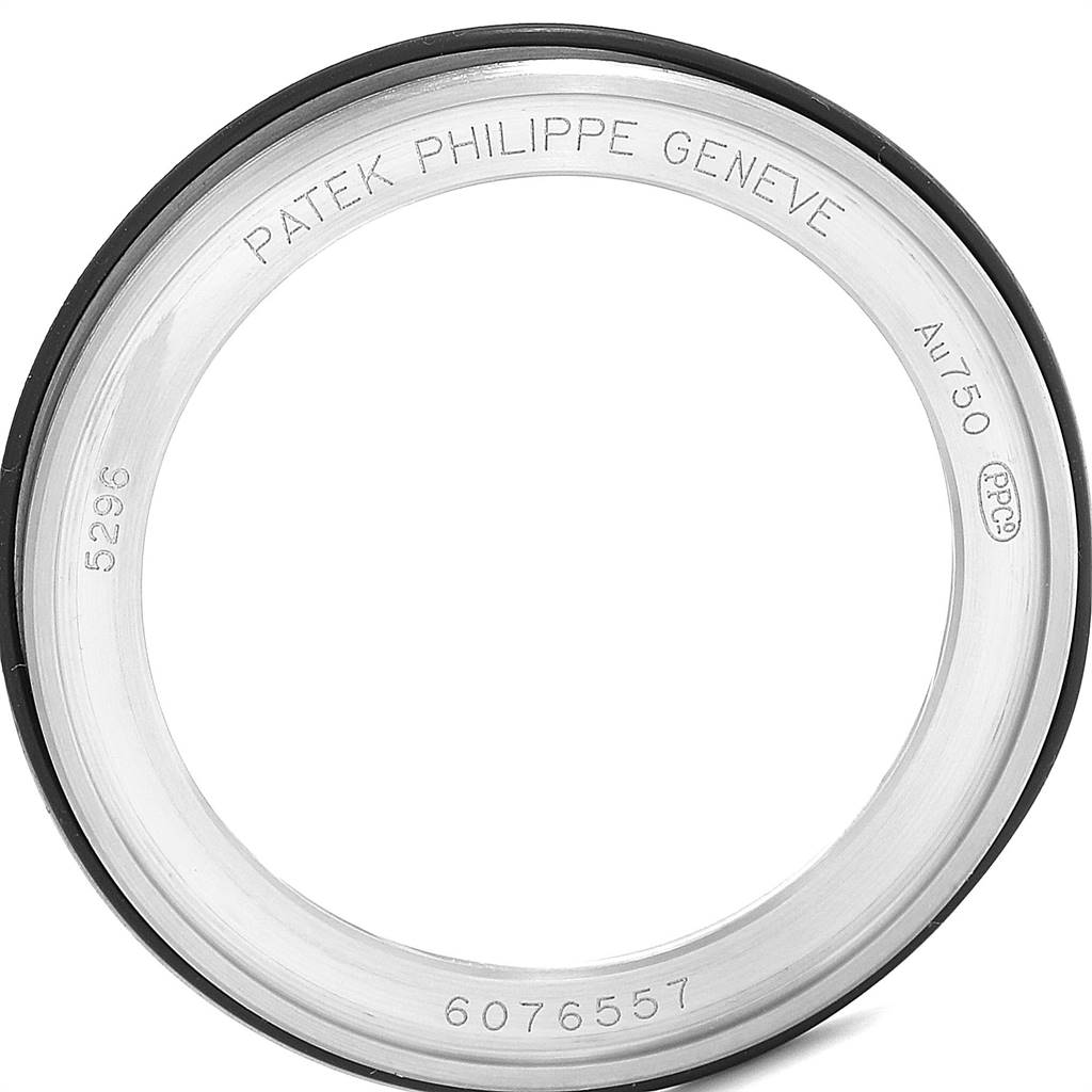 The image shows the bezel of a Patek Philippe Calatrava 5296G Men
s White Gold Silver Dial 5296G Men
s White Gold Silver Dial model watch, marked with inscriptions and model specifics.