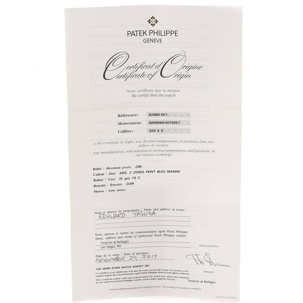 The image shows a certificate of origin for a Patek Philippe Calatrava 5296G Men
s White Gold Silver Dial 5296G Men
s White Gold Silver Dial model watch, photographed from the front.