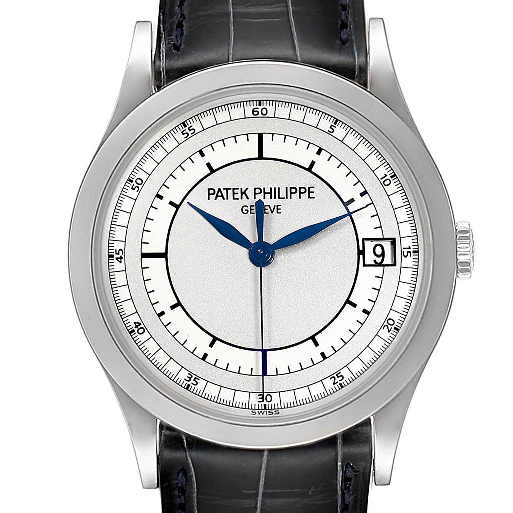 The image shows a front view of a Patek Philippe Calatrava 5296G Men
s White Gold Silver Dial 5296G Men
s White Gold Silver Dial watch, detailing its dial, hands, case, crown, and part of the leather strap.