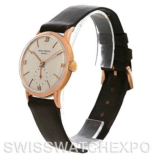 This image shows a side angle of the Patek Philippe Vintage watch highlighting the face, strap, and buckle.