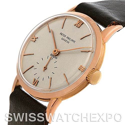 The image shows a side-angle view of a Vintage Patek Philippe watch, highlighting the dial, crown, lugs, and leather strap.