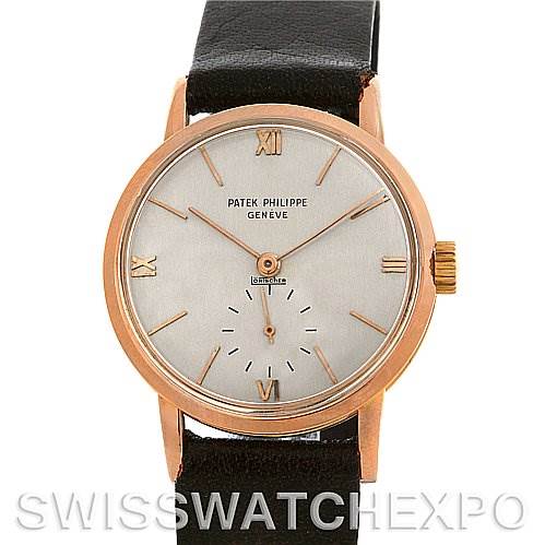 This image shows a front view of a Vintage Patek Philippe watch, displaying the face, hands, crown, and strap.