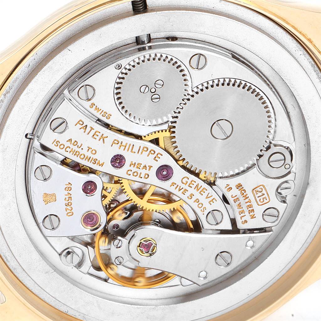 This image shows the back of the Patek Philippe Calatrava 3923 Men
s Yellow Gold Silver Dial 3923 Men
s Yellow Gold Silver Dial watch, highlighting its intricate mechanical movement.