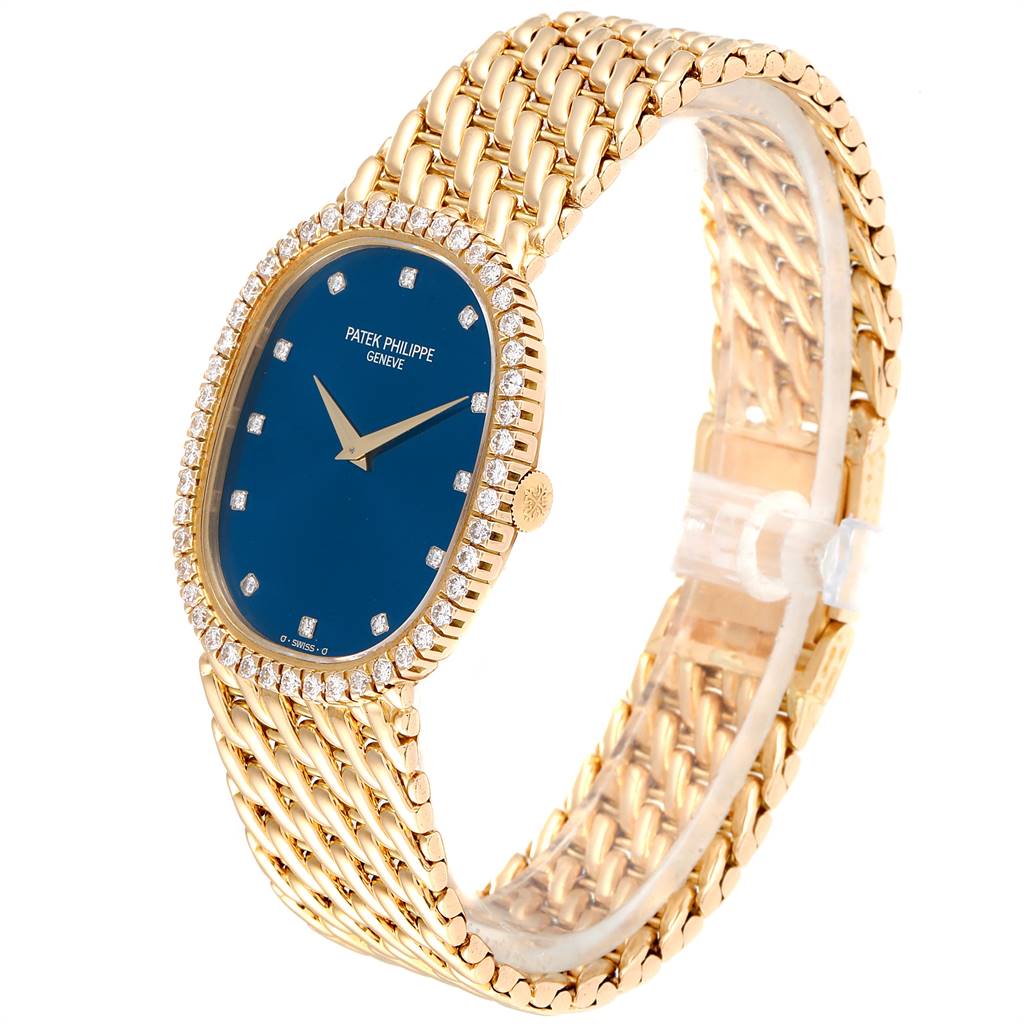The image shows a side angle of the Patek Philippe 3748 Yellow Gold Blue Dial 3748 Yellow Gold Blue Dial Golden Ellipse Blue Dial Yellow Gold Diamond Watch 3748 model.